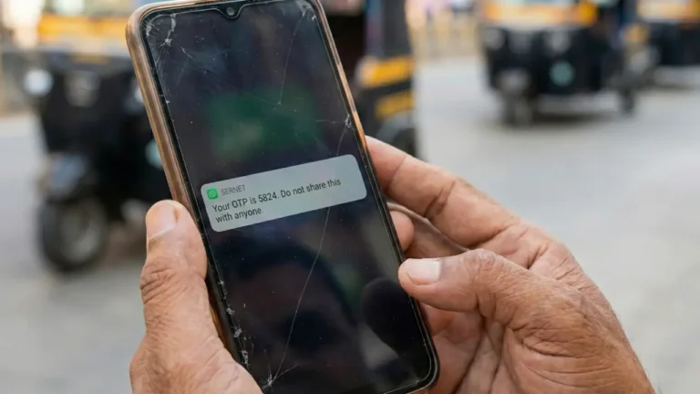 A close-up of an Indian mobile user viewing a confidential One Time Password (OTP) notification on a smartphone screen. The message displays a strict warning "Do not share this with anyone," illustrating OTP safety best practices.